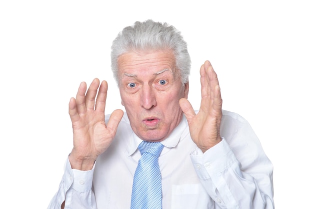 Close up portrait of senior businessman in formal wear posing