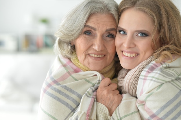 Close up portrait of senior woman with daughter