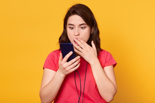 Close up portrait of shocked woman talking to somebody