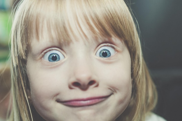 Close-up portrait of smiling girl