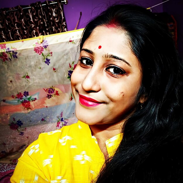 Close-up portrait of smiling girl