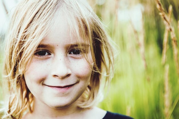 Close-up portrait of smiling girl