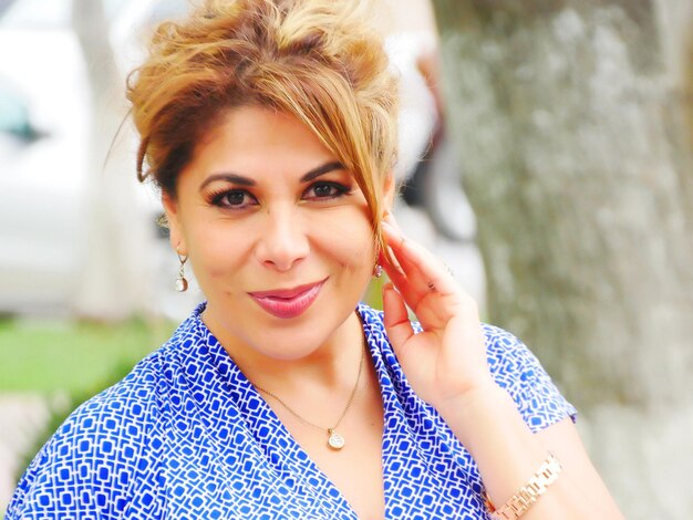 Close-up portrait of smiling mature woman