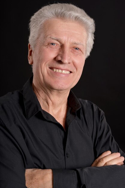 Close up portrait of smiling senior man