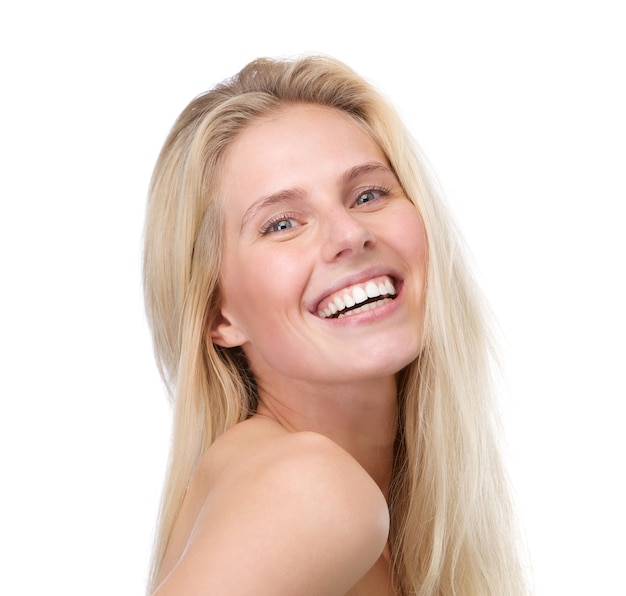 Close up portrait of a smiling young blond woman