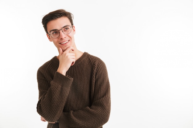 Close up portrait of a smiling young man in sweater