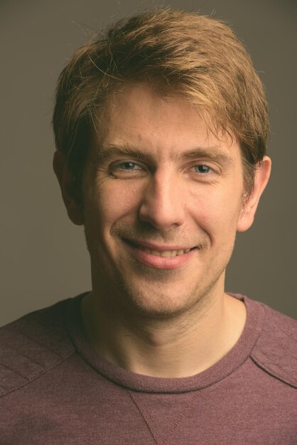 Close-up portrait of a smiling young man