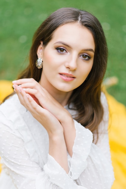 Close-up portrait of stunning woman with natural makeup