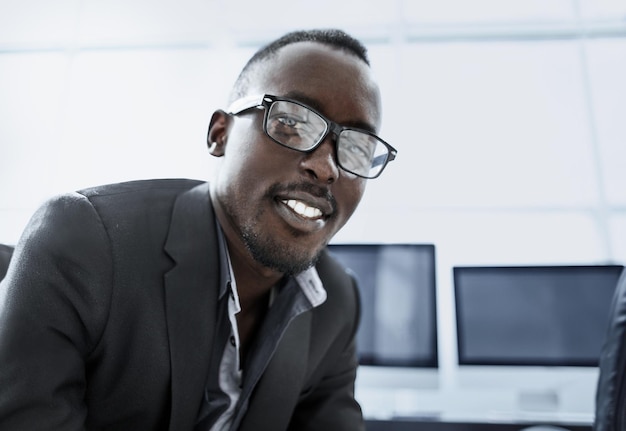 Close up portrait of a successful businessman in the workplace