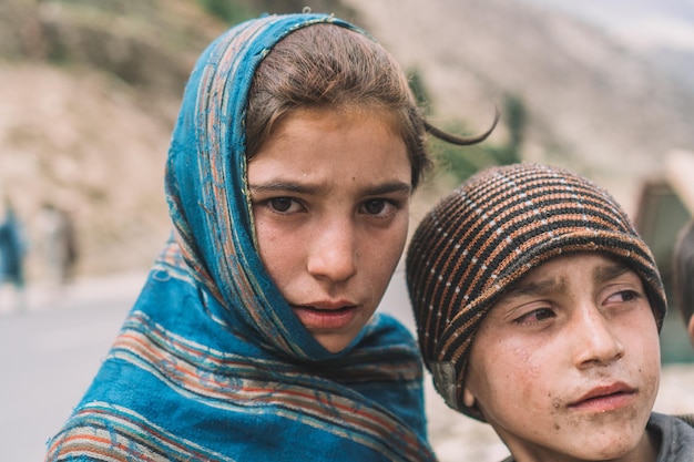 close-up portrait of teenage girl with brother