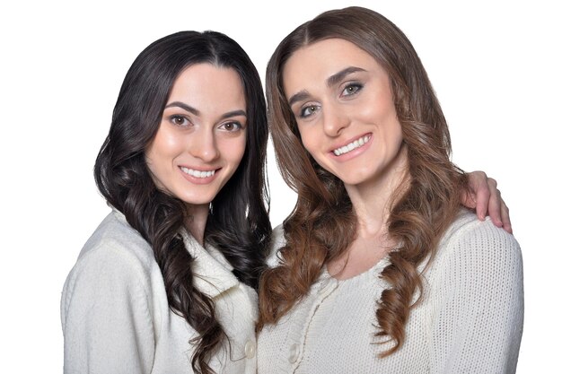 Close up portrait of two female friends