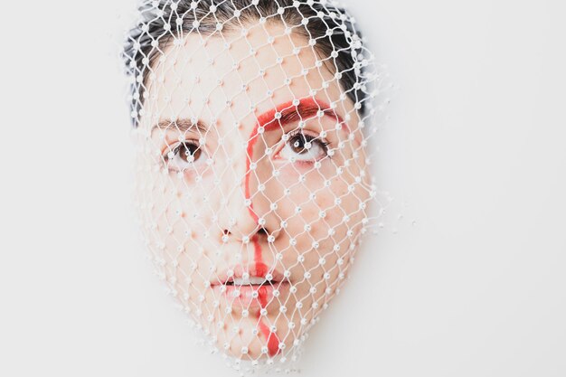 Photo close-up portrait of woman against white background