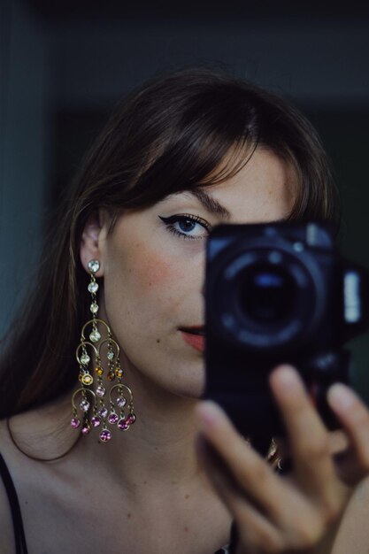 Close-up portrait of woman wearing eyeglasses