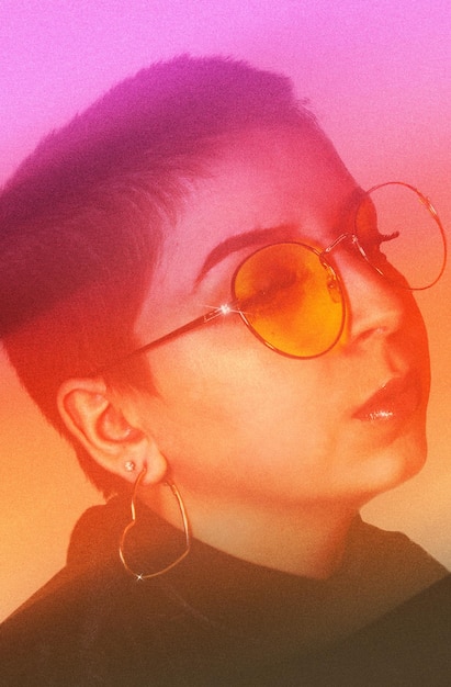 Close-up portrait of woman wearing sunglasses
