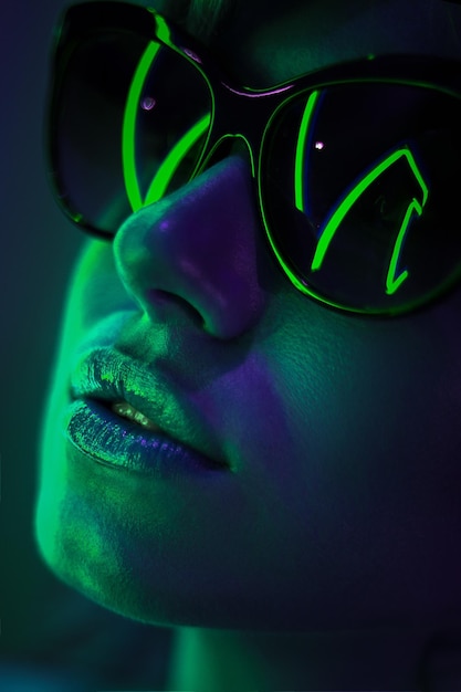 close-up portrait of woman wearing sunglasses