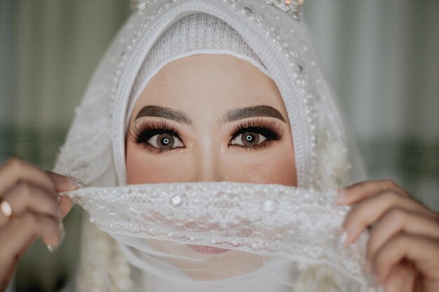 Photo close-up portrait of a woman with hijab