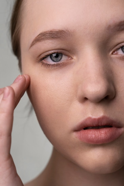 Close up portrait of woman with hydrated skin