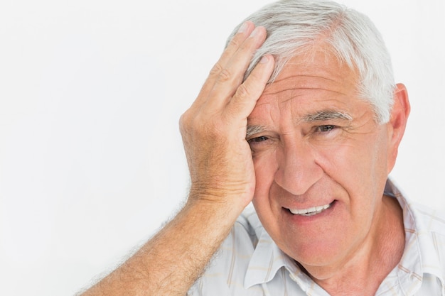 Close-up portrait of a worried senior man