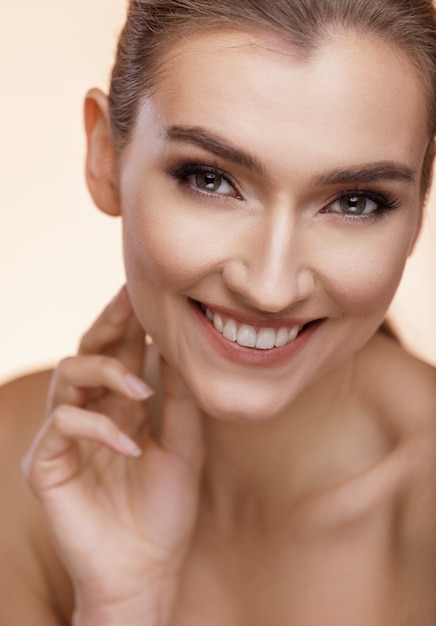 close up portrait of a young girl smiling