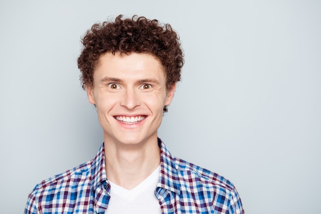 Close up portrait of young guy smiling