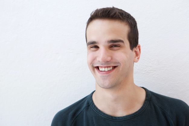 Close up portrait of a young latin man smiling 