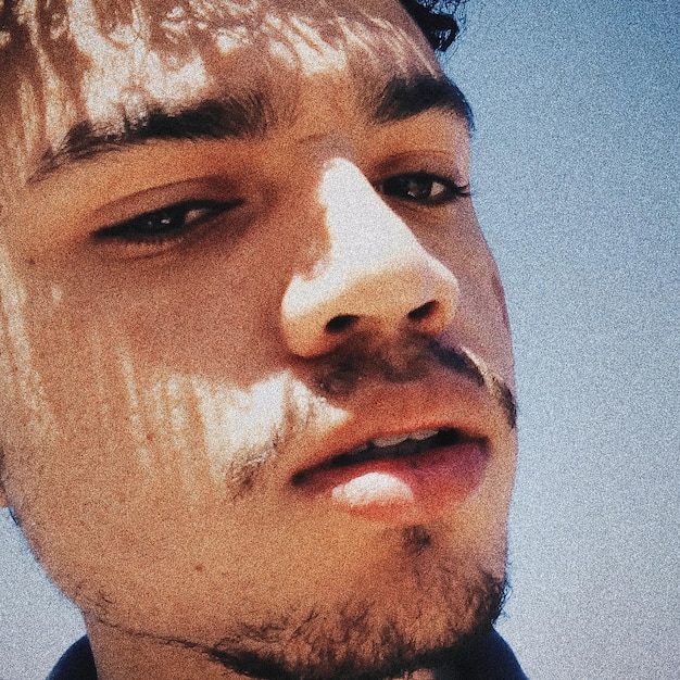 Photo close-up portrait of young man