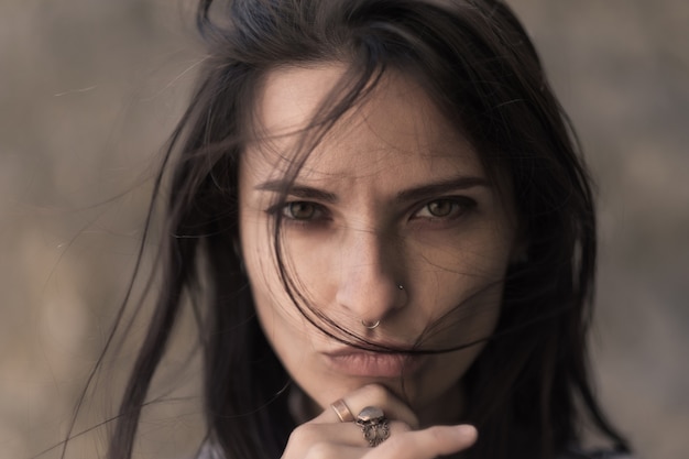 close up portrait of a young serious woman