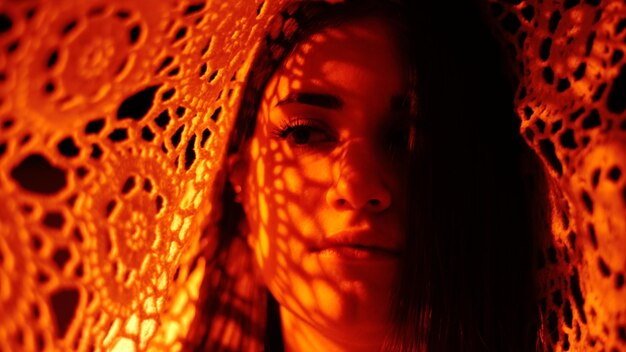 Close-up portrait of young woman looking away