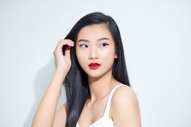 Close-up portret van een jonge aantrekkelijke Aziatische vrouw