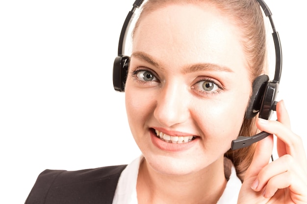 Foto close-up portret van zakenvrouw met een headset die tegen een witte achtergrond staat