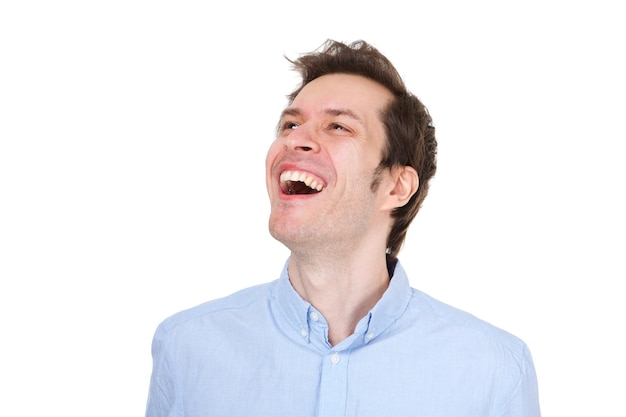 Close up positive business man laughing on white background