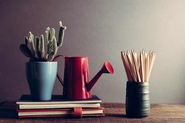 Photo close-up of potted plant on table against wall at home