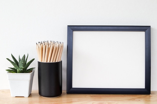 Photo close-up of potted plant on table against white background