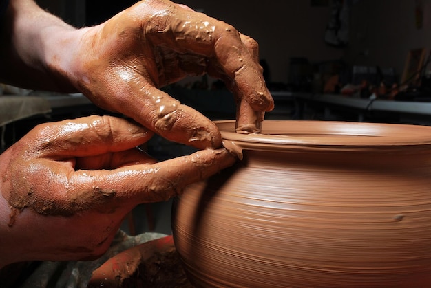 close-up of potter in action