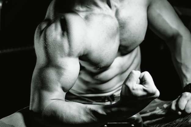 Close-up of a power fitness man's hand.