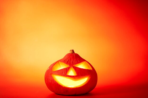 Close-up of pumpkin against orange background