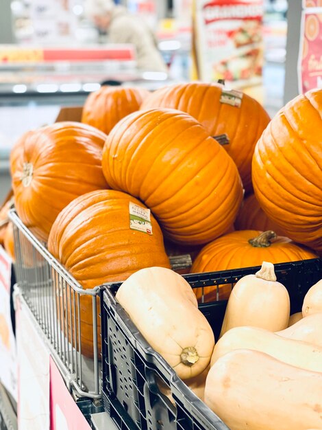 Close-up of pumpkins for sale at market stall