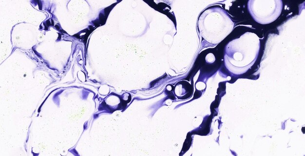 Premium Photo | A close up of purple paint with a black background