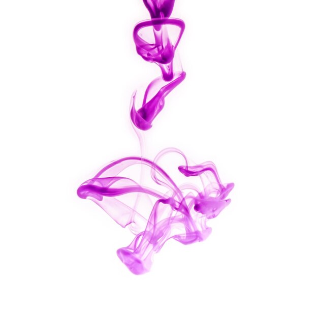 Close-up of purple smoke against white background