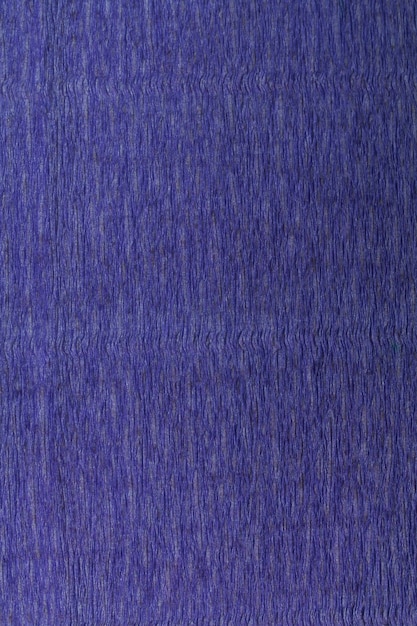 Close up purple toned crepe paper texture background