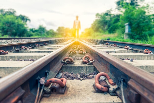 Close-up of railroad tracks against sky