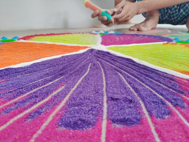 Close-up of rangoli with multi colored powder