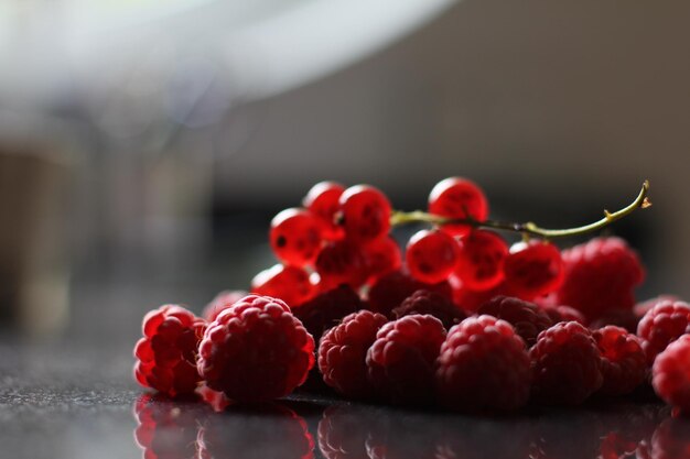 Close-up of raspberry and berries on table