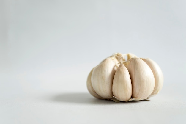 Close up raw garlic isolated on white background