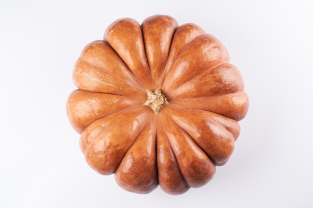 Close-up raw orange pumpkin isolated on white food background