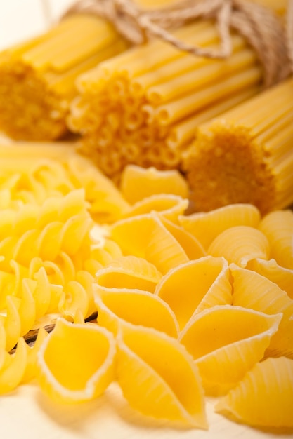 Close-up of raw pasta on table