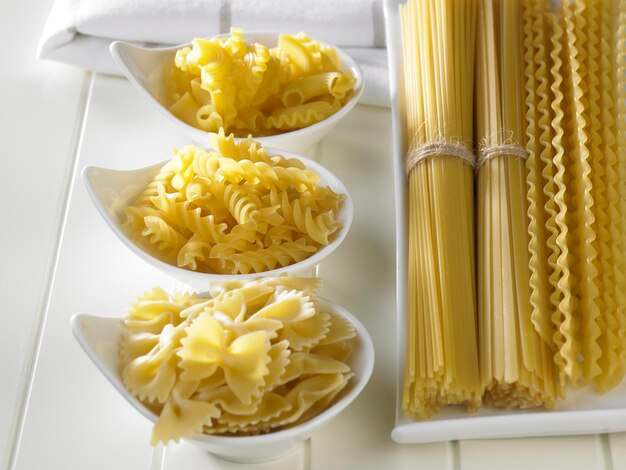 Close-up of raw pasta on table