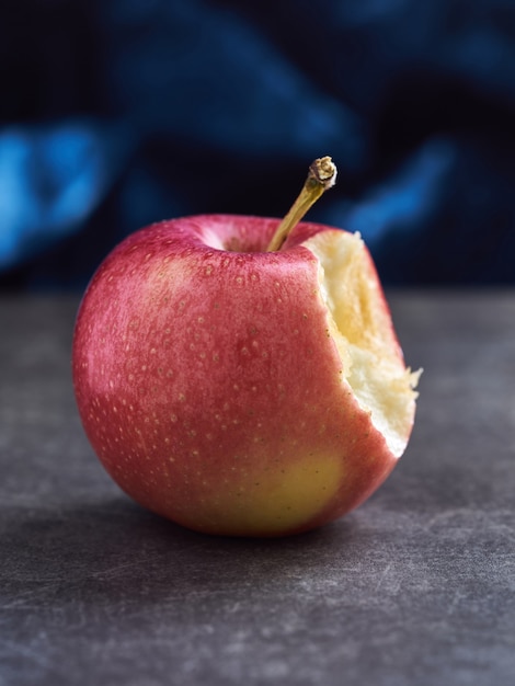 Close up red apple on table