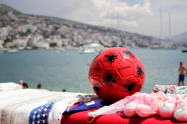 Close-up of red ball on beach