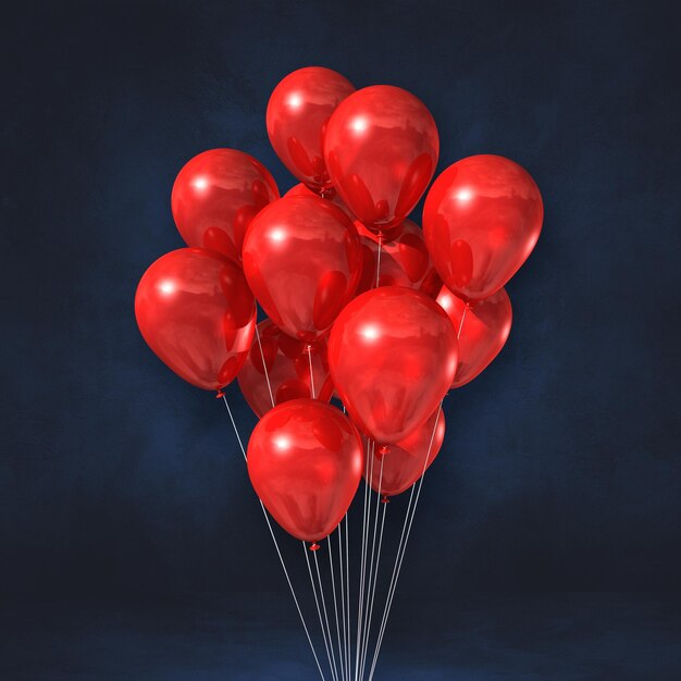 Photo close-up of red balloons against black background